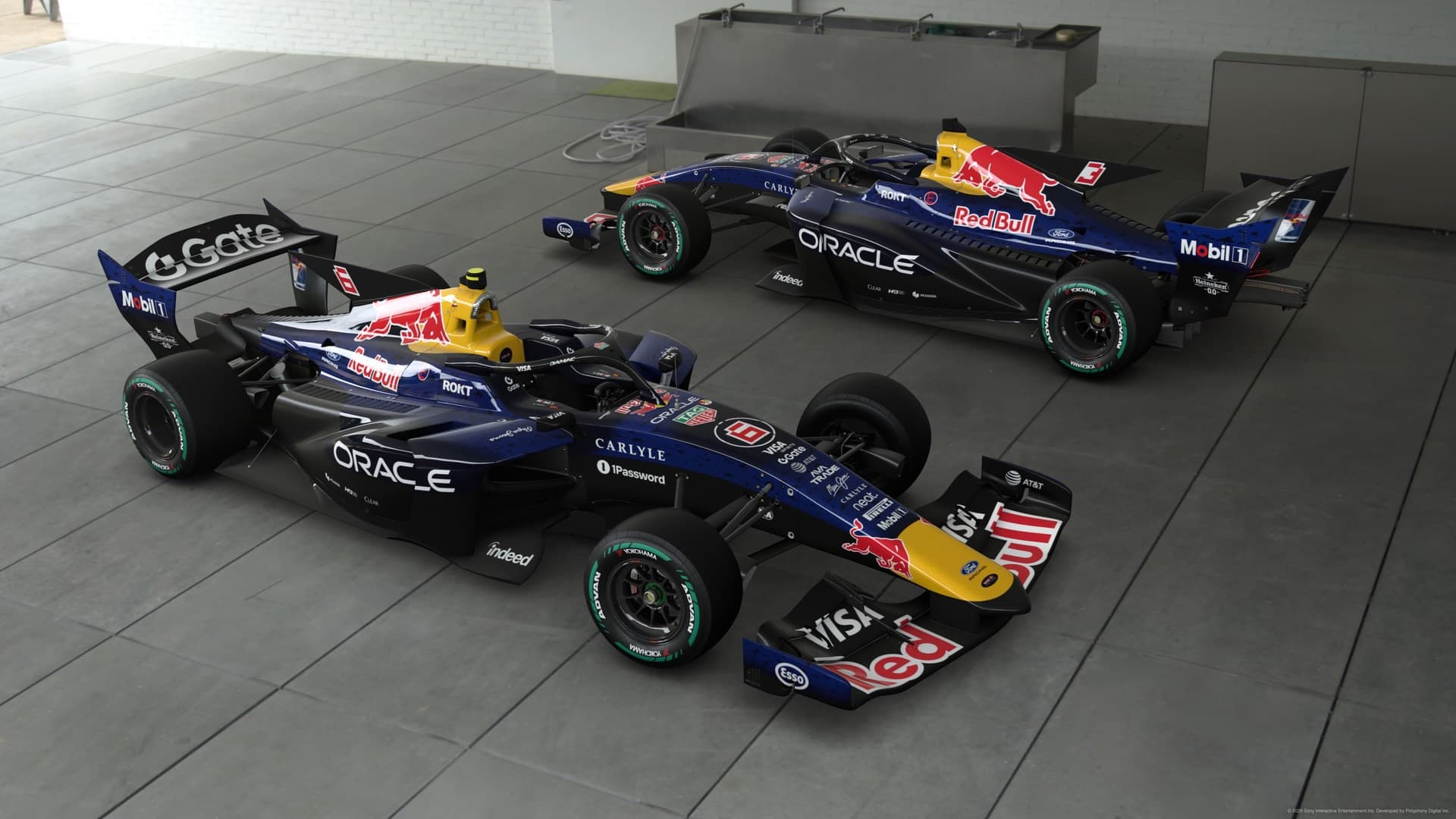 Two Formula race cars displayed together